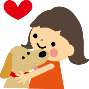 犬のケアをしてあげる女の子