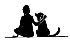 人と犬が仲良く寄り添っている